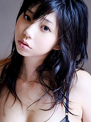 Beautiful gravure idol with milky white skin in silky lingerie