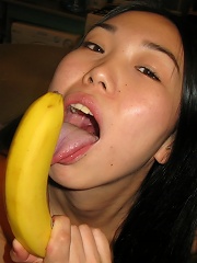 Skinny asian teen gets drunk and wild with a banana