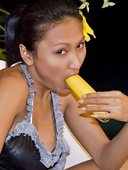 Thai Rowena sucking a banana