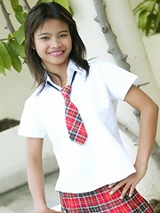 Schoolgirl Tussinee in an after school photo shoot